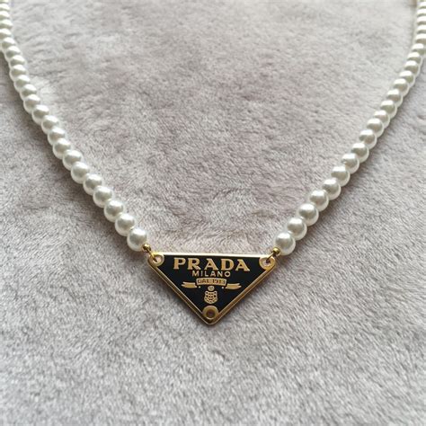 prada pearl necklace|Prada silver tag necklace.